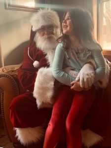Santa Claus with Little Girl on his lap